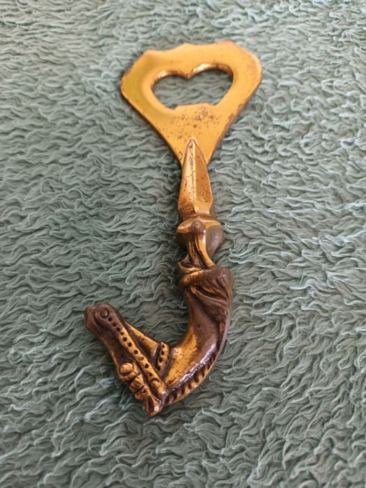 Abre cápsulas e  mini cinzeiro