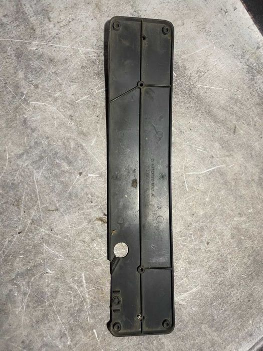 Кріплення подіум під номерний знак передня Mercedes W124 1248851023