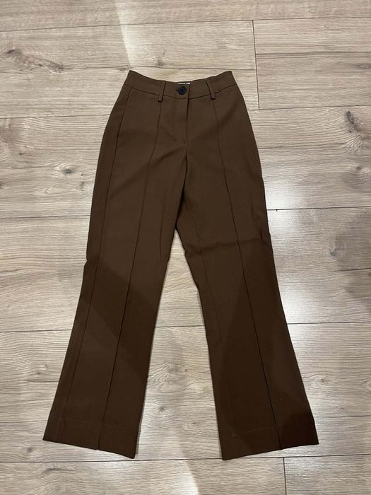Spodnie brązowe,  eleganckie Bershka 34