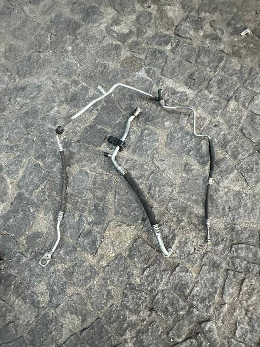 Mecanismo de limpar vidros + tubos de ar condicionado