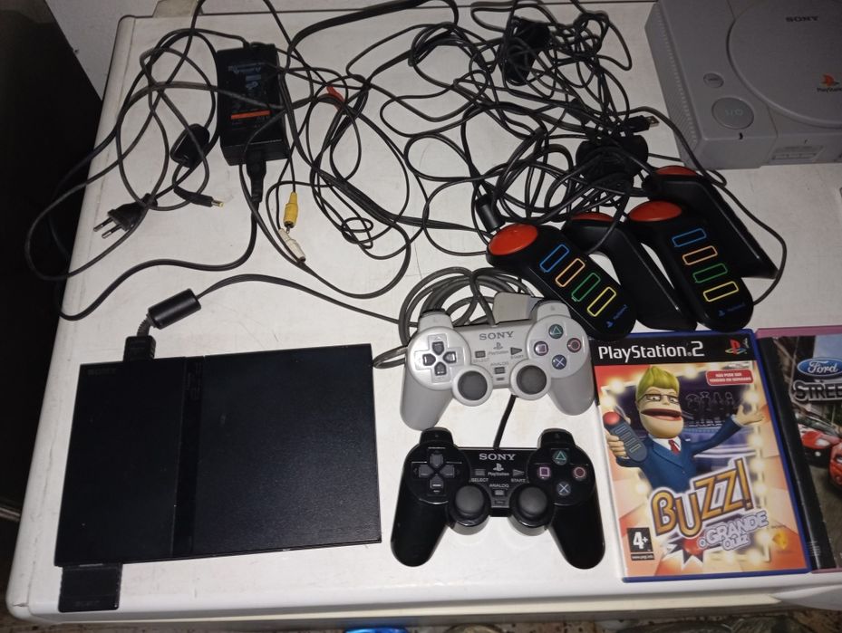 PlayStation 1 e 2 jogos Buzzy com comandos jogos volante e pedais com
