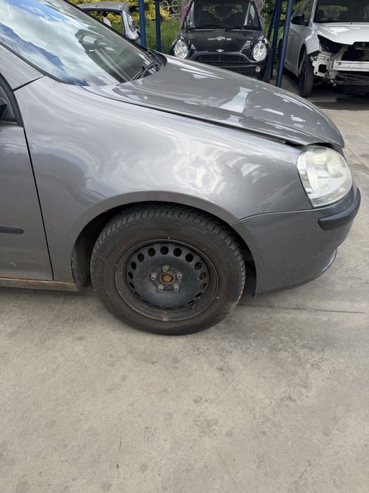Błotnik Volkswagen Golf V LA7T lewy prawy przód