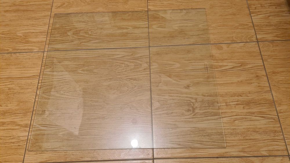 Szyby przesuwne do biblioteczki.