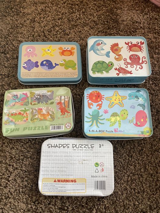 Пазли дитячі в металевих каробках