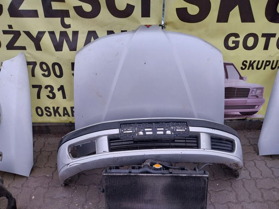 Mitsubishi Carisma zderzak  lampa chłodnice belka pas kpl