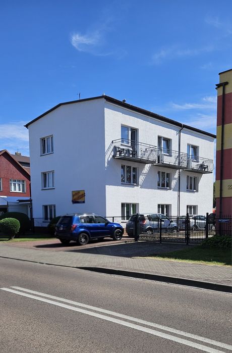 Pokoje i apartamenty z balkonami