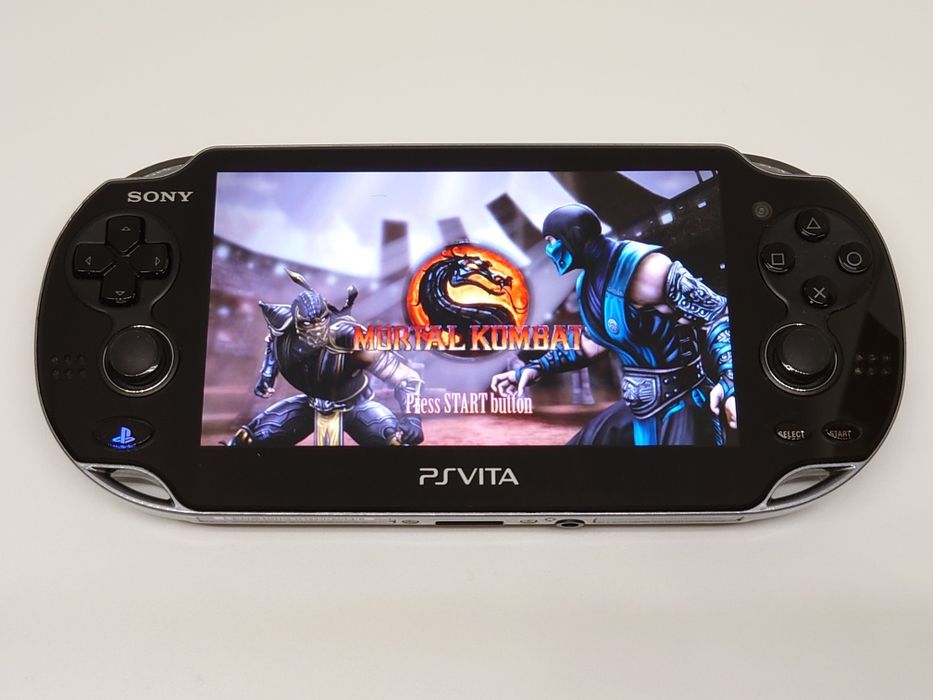 Sony PS Vita OLED 64 gb в гарному стані + чохол