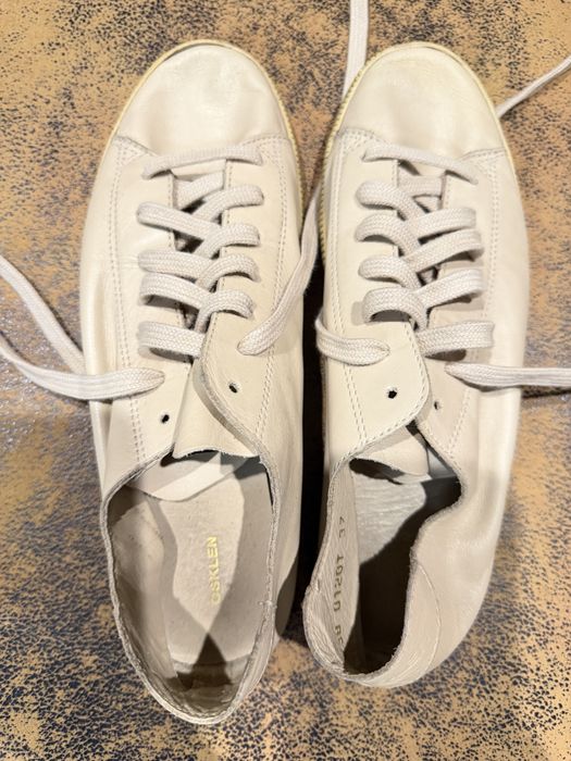 Osklen tenis em pele