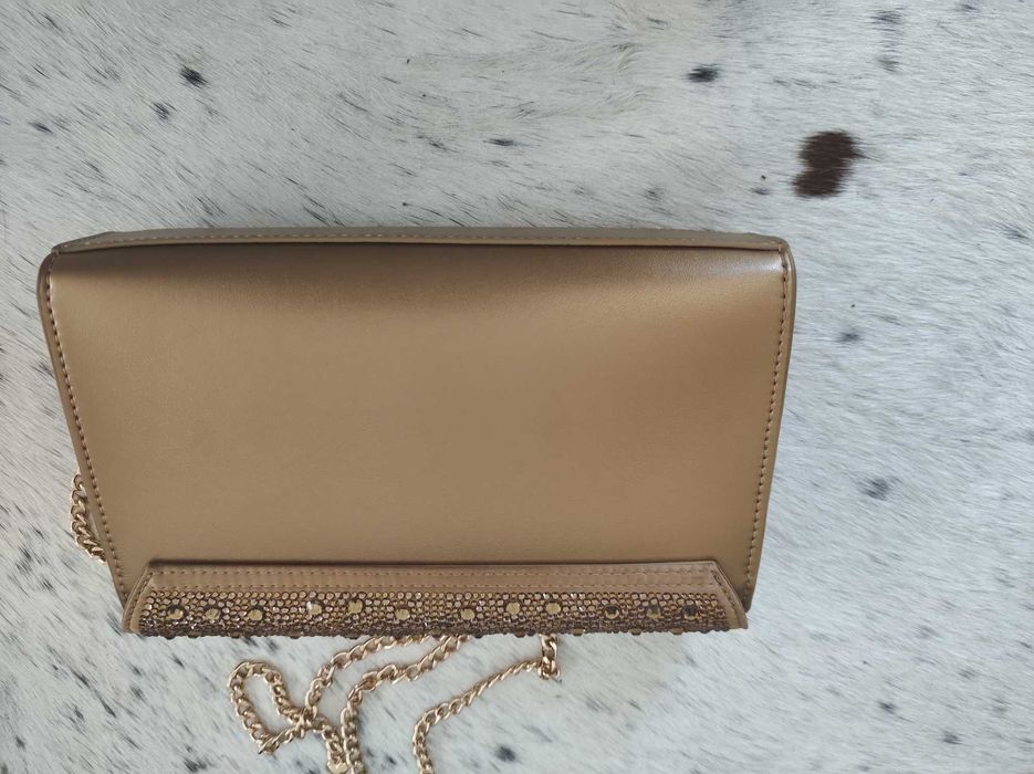 Vendo carteira tipo pochete, Love Moschino, dourada com brilhantes.