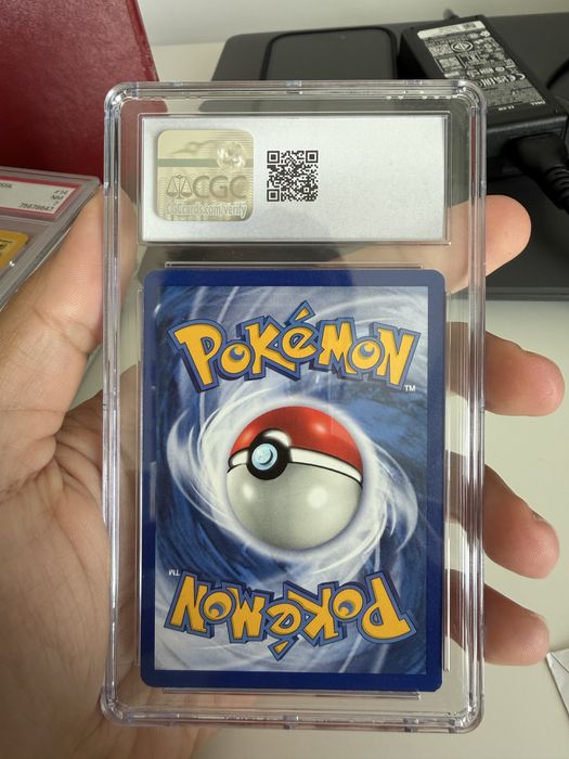 Carta pokemon graded lightning energy 1st edition base set