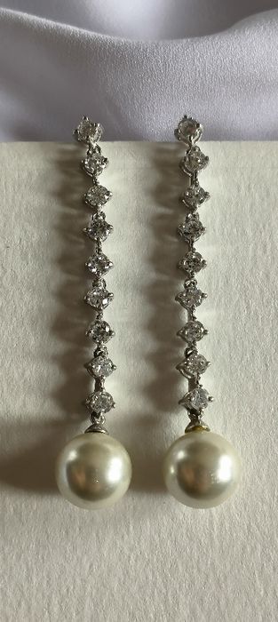 Brincos em prata com pedras