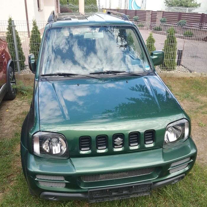 Suzuki Jimni qwatro,80 tys km,4 osobowy,pilot,radio,hak