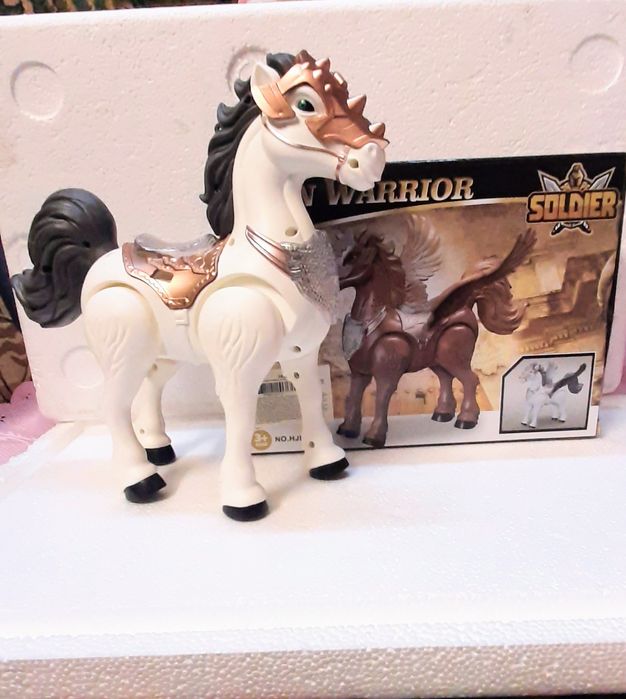 Игрушка  музыкальная  - лошадка  Пегас