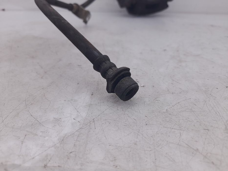 Pinça travão / maxila de travão frente esquerda TOYOTA Auris Touring S