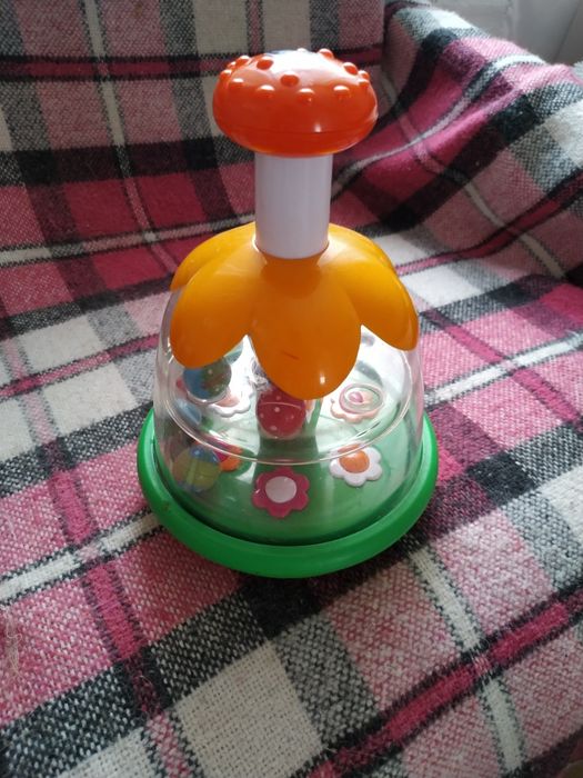 Продам детскую игрушку юлу Chicco