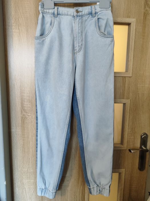 Dwukolorowe jeansy Sinsay ściągacze rozm. 38 cał