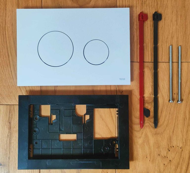 Nowy TECEloop przycisk spłukujący do WC, biały mat