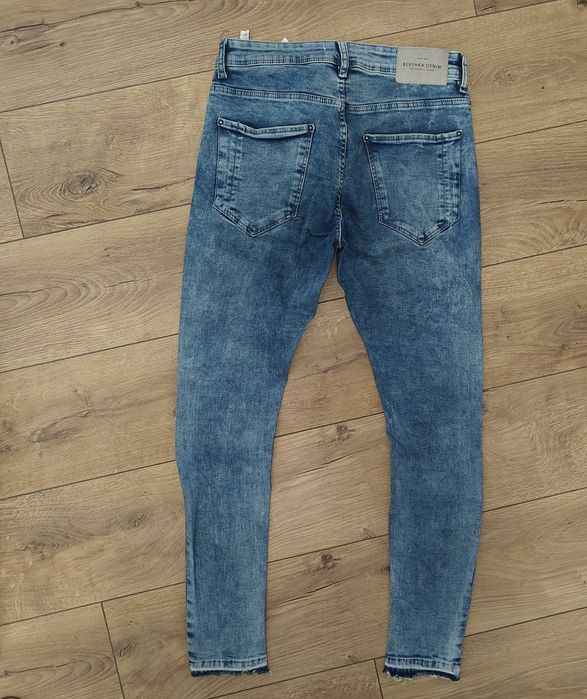 Męskie świetne spodnie jeansowe Bershka slim fit rozmiar 31 stan BDB