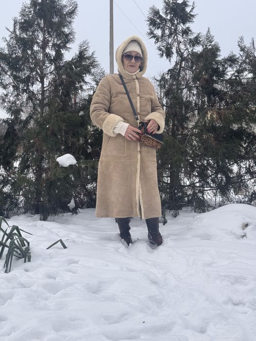 Дублянка жіноча длинна світлого кольору