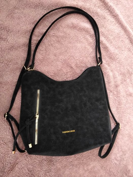 Жіночі сумочки .