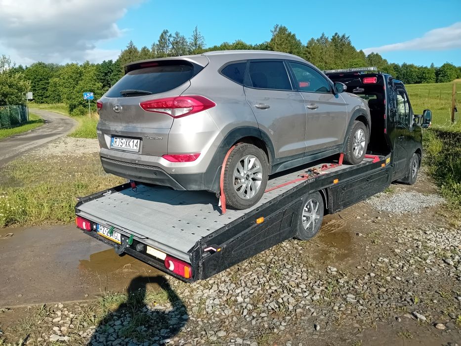 Pomoc drogowa  Tania laweta Transport między warsztatami