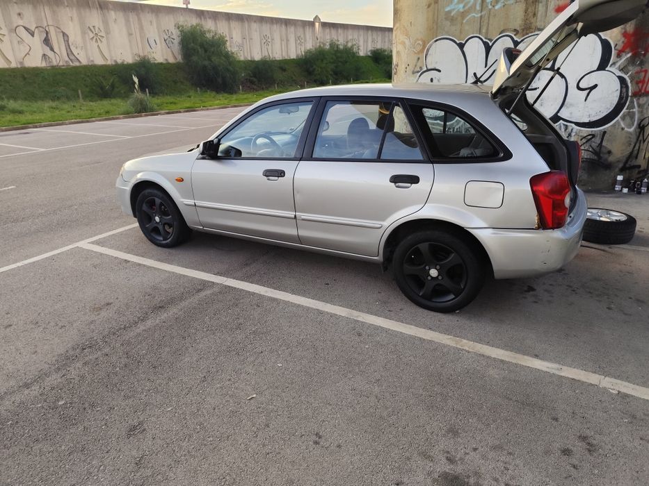 Mazda 323f 1.3 gasolina 2003