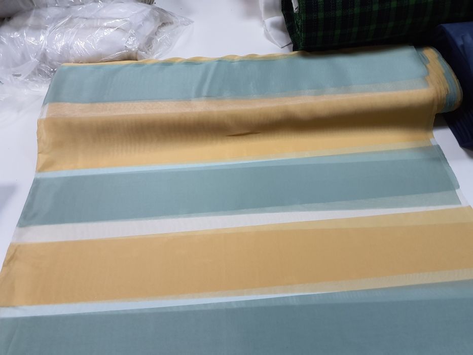 Tkanina ozdobna żółto-seledynowa szer.152 cm.