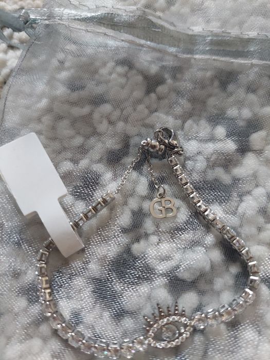 Pulseira prateada em aço nova