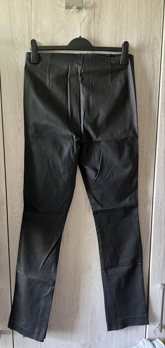 Spodnie skórzane ekoskóra szerokie dzwony 42 reserved