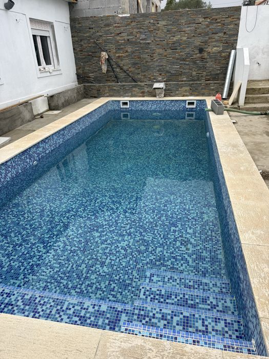 Construçao e reablitačaõ de piscna canalizaçao e casas de makina