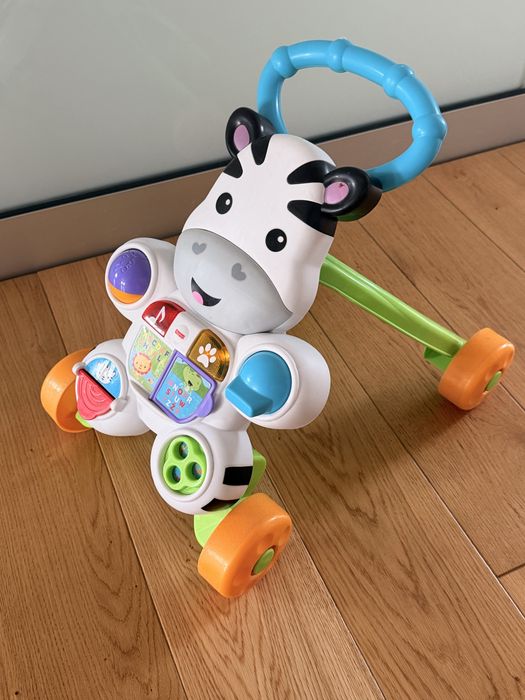 Fisher-Price Zebra- pchacz  do nauki chodzenia