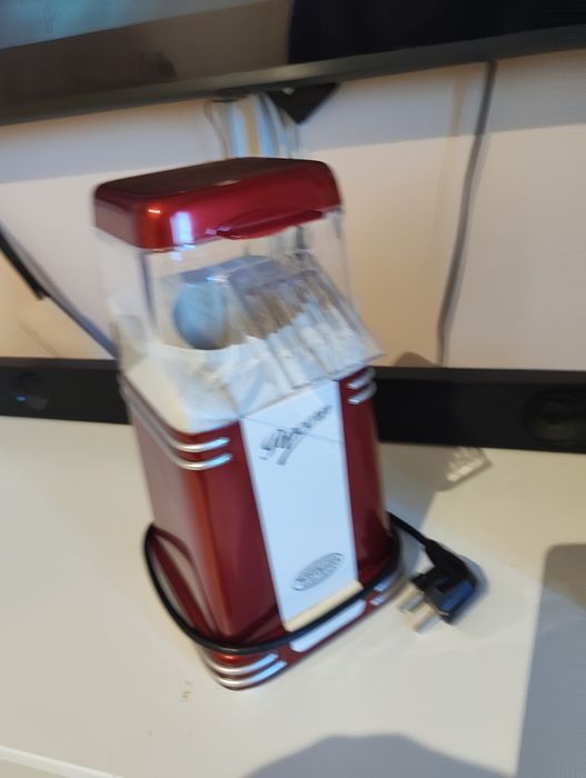 Máquina de fazer pipocas.