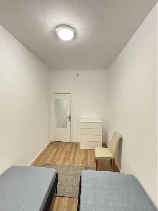 Cama em quarto partilhado