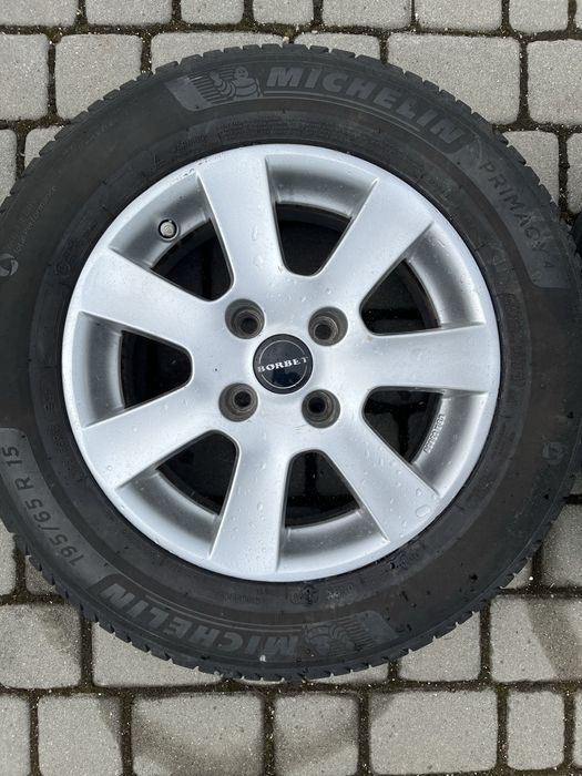 Alufelgi 4x108 15 cali Peugeot Partner Citroen Berlingo C4 Ford Fiesta Fokus KA B-max Figo Transit Courier opony 195/65/15