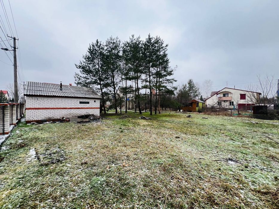 Продам участок в Обуховке,сосновый лес,река пляж закрытая территория