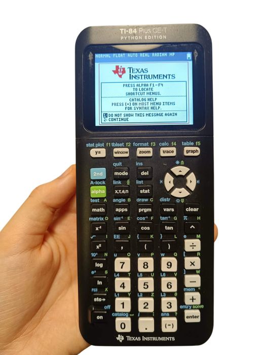 Texas Instruments TI-84 Plus Python + pudełko, dedykowana ładowarka, instrukcje