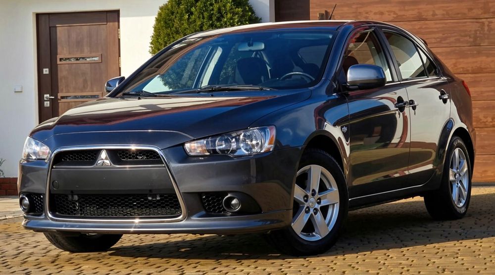mitsubishi lancer viii sedan 2008-2015 chrom ramka grilla 6400b398 + śruby