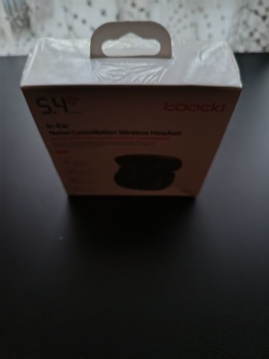 Продам безпровідні навушники tooki