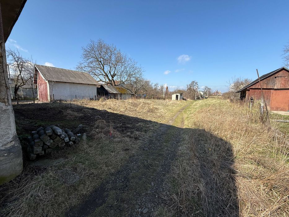 Ділянки 24 сот.землі та будинку  по вул. Шашкевича 150 у с. Дуліби