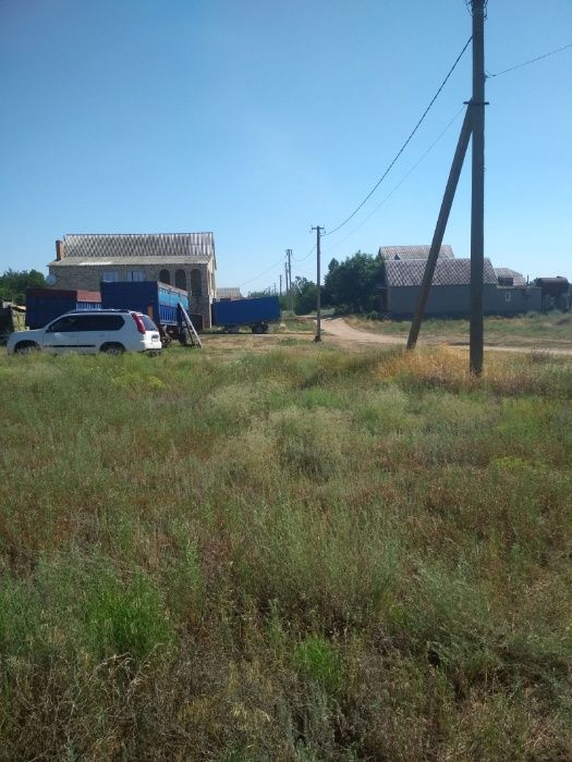 продам или обменяю на автомобиль участок земли под постройку дома