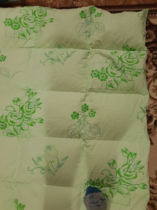 Пухова перина нова