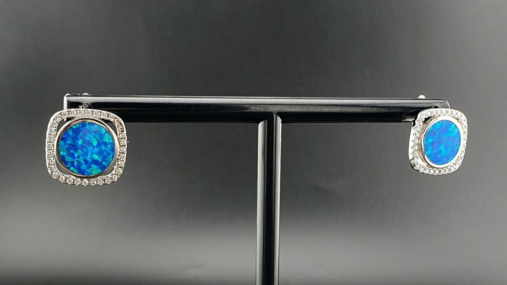 Okazałe kolczyki srebrne p.925 z niebieskim opalem i cyrkoniami