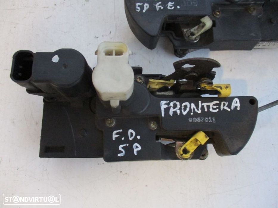 Fechadura porta Opel Frontera B 5p frente esquerdo / direito