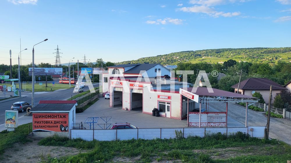 Земельна ділянка 26 соток з СТО, мийкою та готелем
