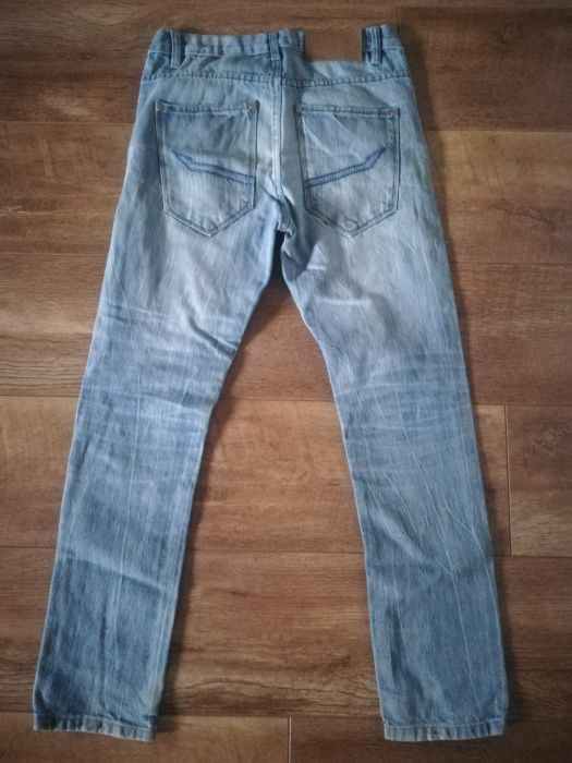 Spodnie jeans 152