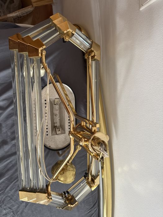Luminaria em Metal dourado com Laminas de Vidro com detalhes Dourado.