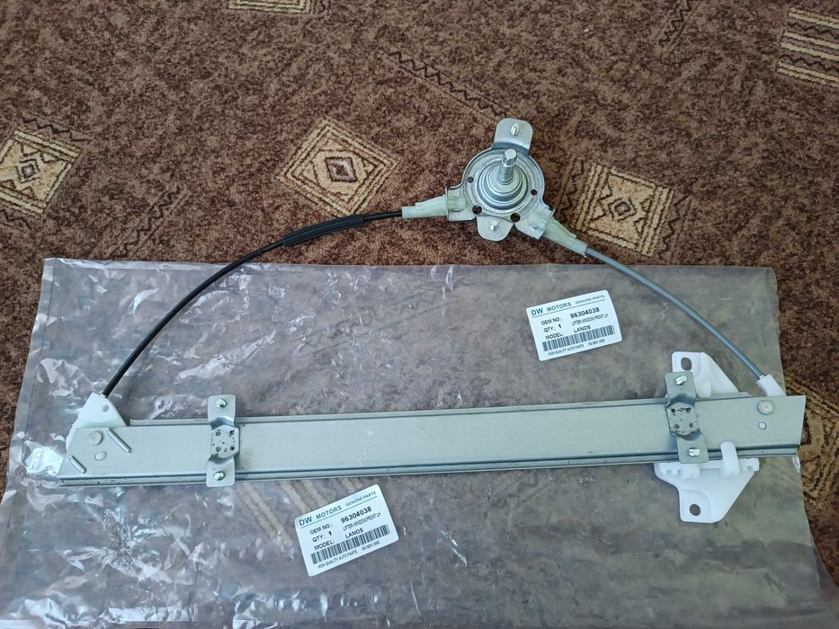 Склопідйомник GENUINE Ланос, Сенс передній лівий (МЕХАНІЧНИЙ)