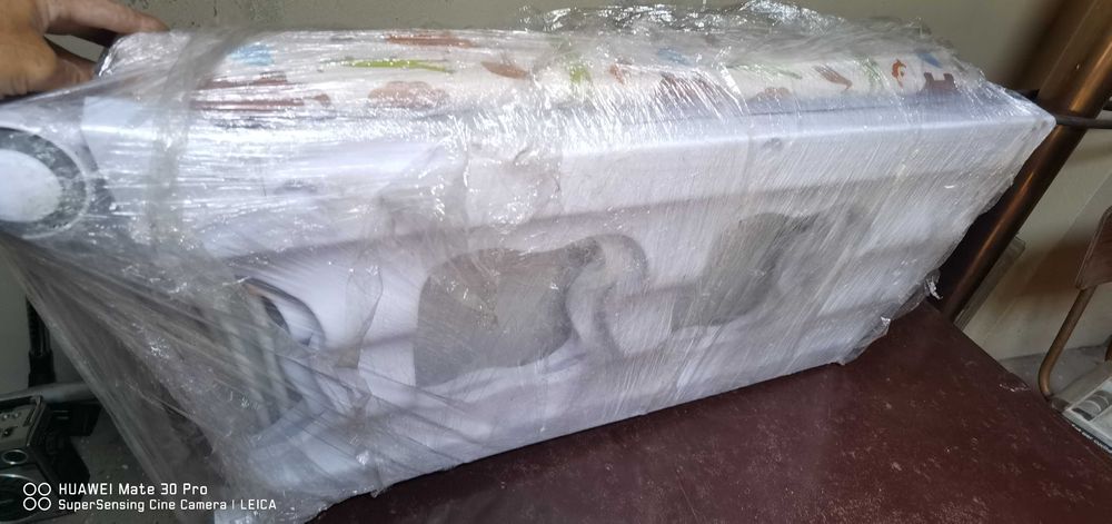 Banheira e muda fraldas de bebé