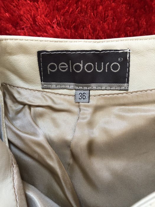 Saía de couro, nova