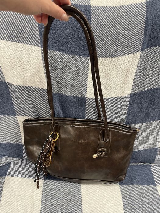 Сумка коричневого кольору